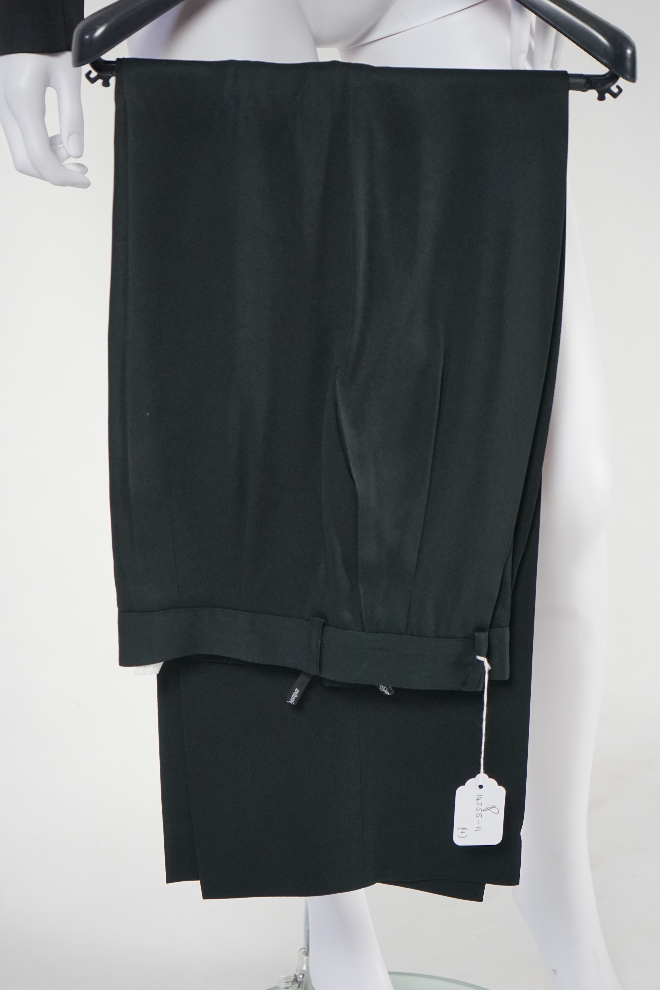 Two vintage Yves Saint Laurent lady's variation black trouser suits, F 42 (UK 14). Please note alterations to make the waist smaller may have been carried out on some of the skirts. Proceeds to Happy Paws Puppy Rescue.